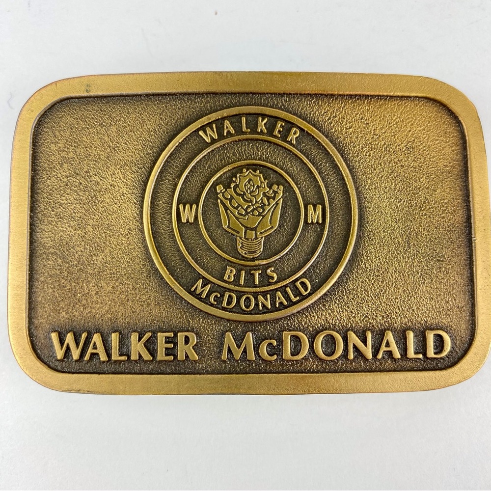 Vintage Walker McDonald Brass Belt Buckle Drill Bits Canada Hit Line USA 3 x 2"
